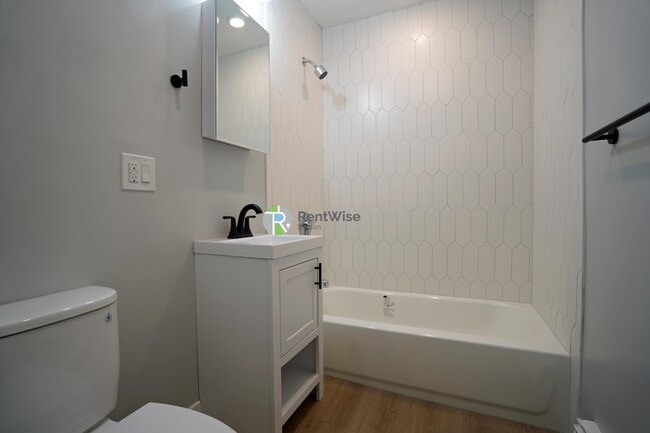 Photo - 745 E 6th St Apartment