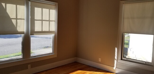 Two bedrooms downstairs with small closets - 1318 Armstrong Ave.