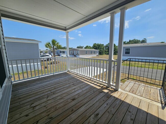 Building Photo - 6661 Hidden Oaks Dr