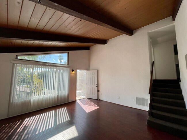 Building Photo - Fabulous Duplex Unit with Vaulted Ceilings...