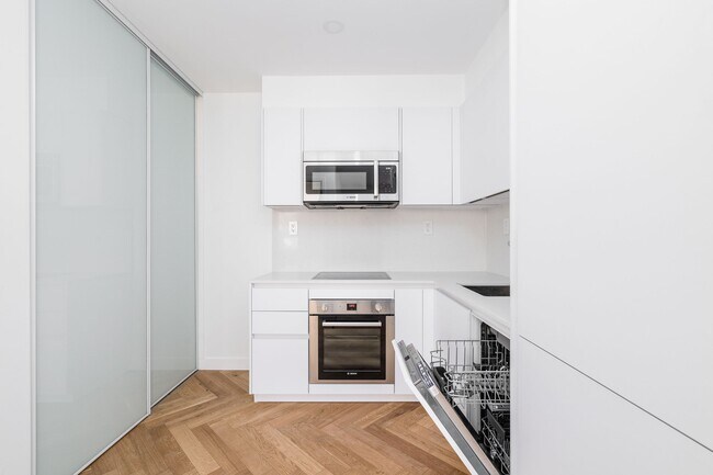 Photo du bâtiment - 110 Wellesley St E