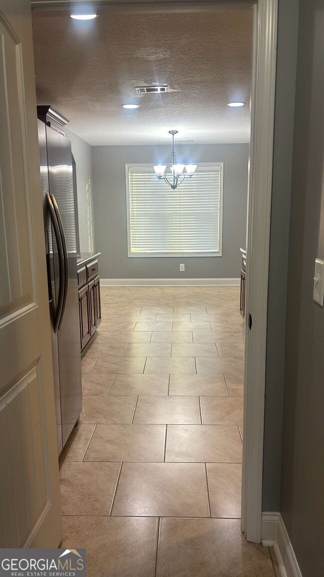 Foto del edificio - 303 S Charity Ln