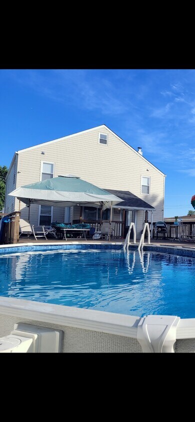 Above ground pool and deck - 518 Virginia Ave