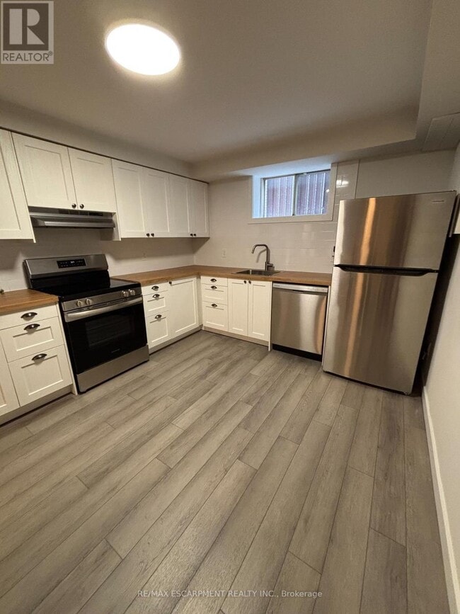 Photo du bâtiment - 19 Pavarotti Ct