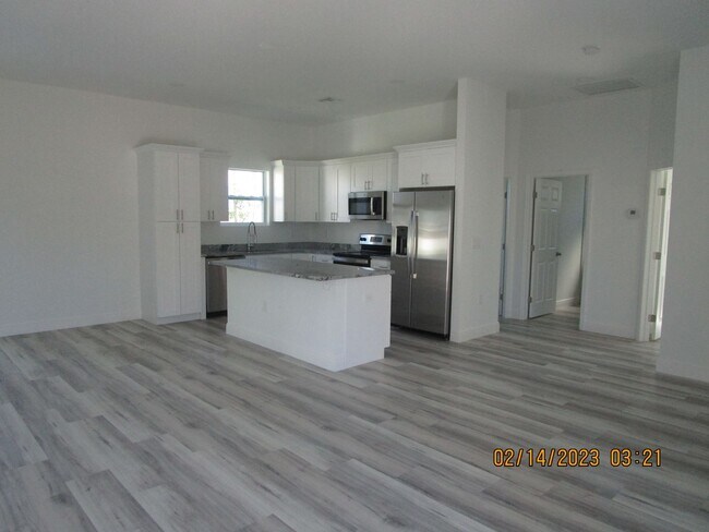 Building Photo - Like New 3/2/2 w/ Den Avail Now in NE Cape...