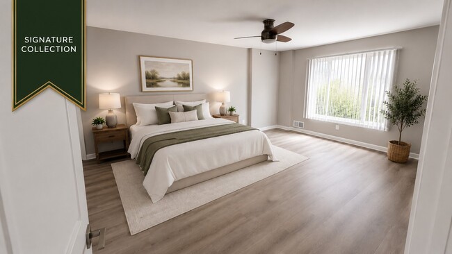 Signature Collection Primary Bedroom - Corner Place Apartments