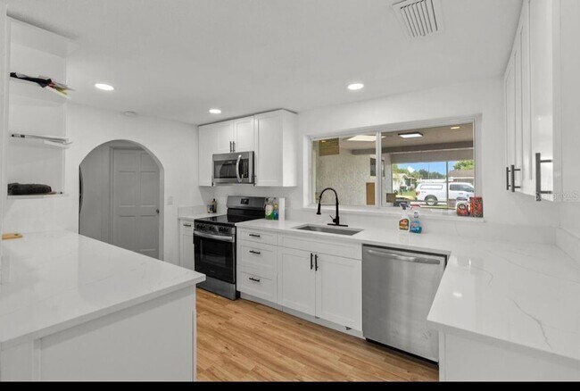 Building Photo - 3421 Port Charlotte Blvd