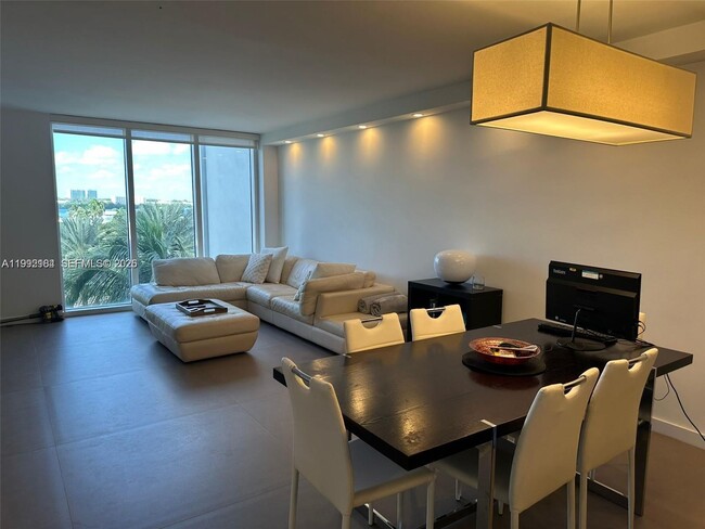 Building Photo - 10275 Collins Ave