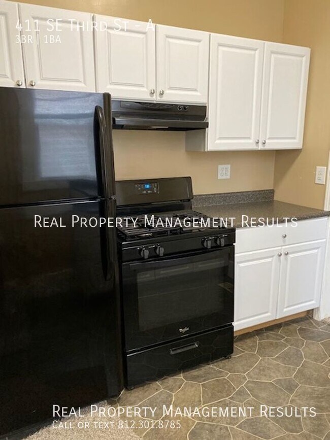 Building Photo - 411 SE Third St-A