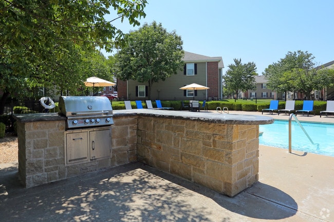 Parrilla junto a la piscina - Aspen Village