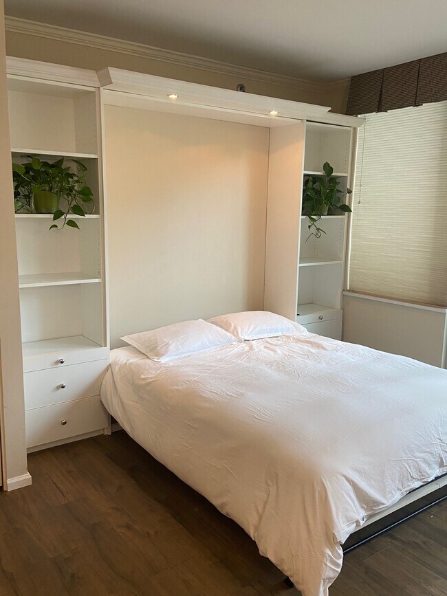 Wall Bed with Linens - 2600 2nd Ave