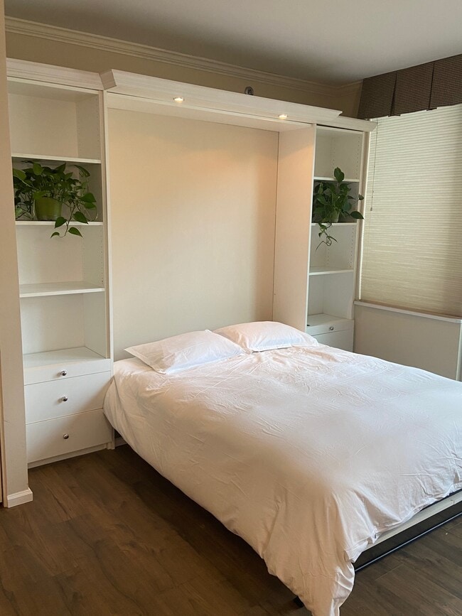 Wall Bed with Linens - 2600 2nd Ave Apartment