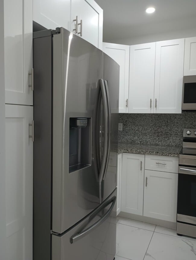 Photo - 3820 E 9th Ln House