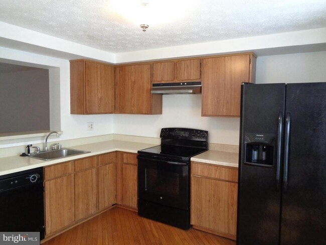 Building Photo - 15334 Norwalk Ct