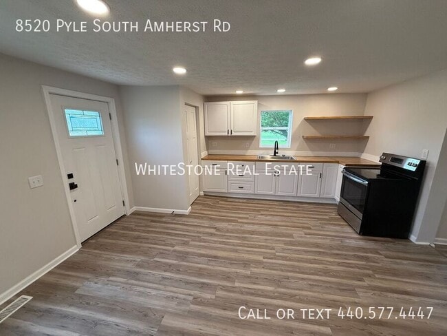 Building Photo - 8520 Pyle South Amherst Rd