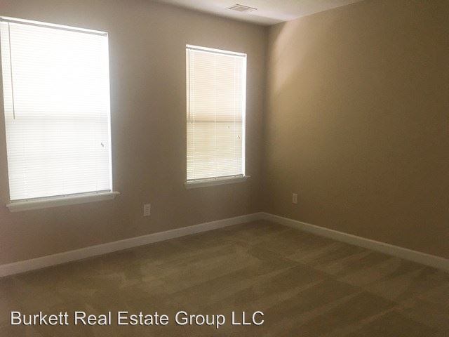 Building Photo - 4 br, 2.5 bath House - 5079 Wells Dr.