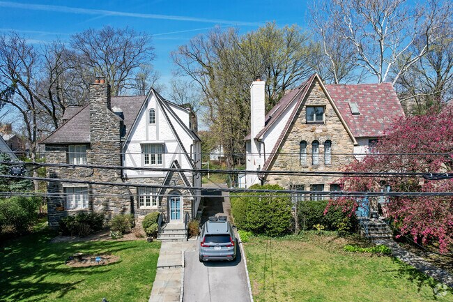 Spuyten Duyvil Tudor homes have patios & backyards.