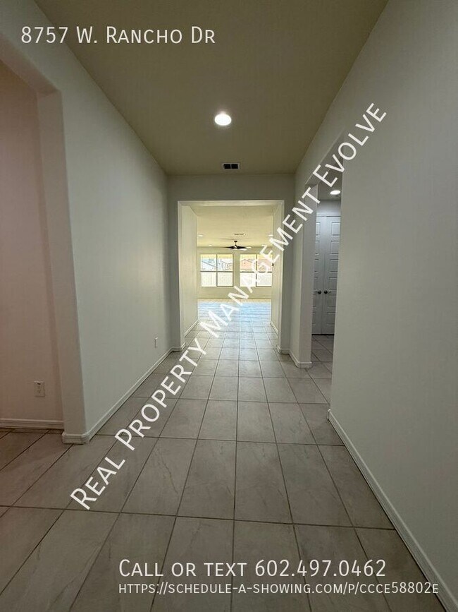 Building Photo - 8757 W Rancho Dr