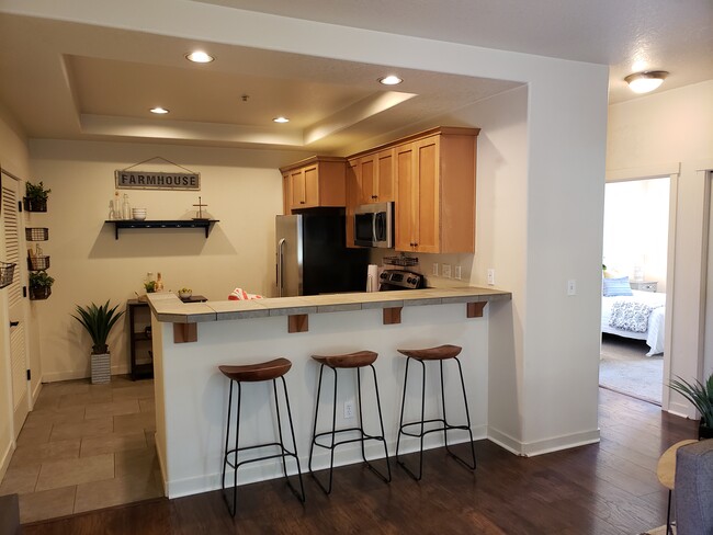 Kitchen with Breakfast Counter - 8142 NE Miriam Way