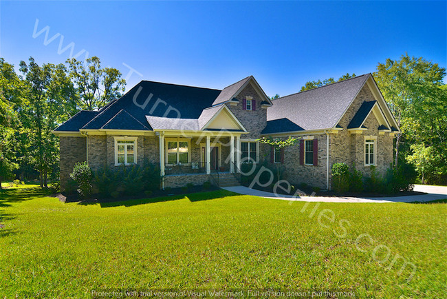 Building Photo - Stunning 5 BR Brick Home on Lake Carolina