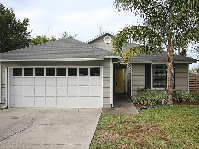 Charming beachside home with welcoming entry and two-car garage. - 953 13th Ave S