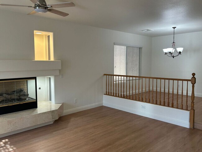 Building Photo - New flooring and freshly painted 4 bedroom home