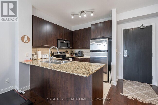 Photo du bâtiment - 88-688 Broadway Ave