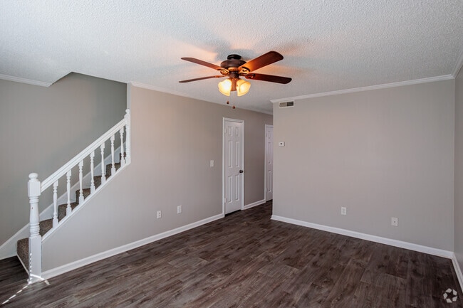 2BR, 1.5BA - 1100SF - Living Room - Woodland Manor Condominiums