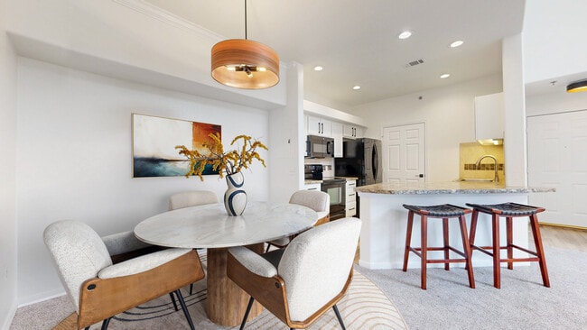 Dining Area overlooking kitchen and bar area - 6021 Castlegate Dr W