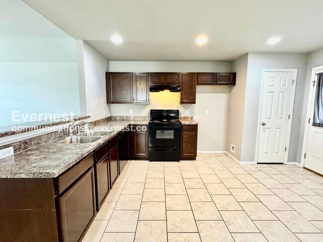 Building Photo - 6707 N 128th E Ave