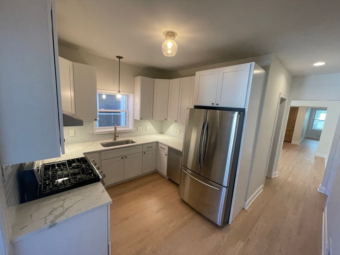 All stainless steal appliances. Large French door fridge and dishwasher. - 5435 N Ashland Ave