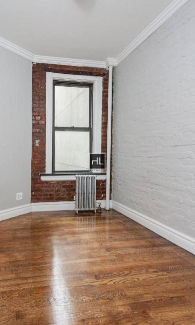 Building Photo - SPACIOUS East 13th Street 2 Bedroom