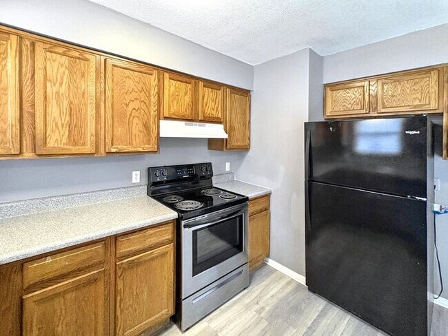 Foto del edificio - Spacious 4-Bedroom Home in a Prime Locatio...