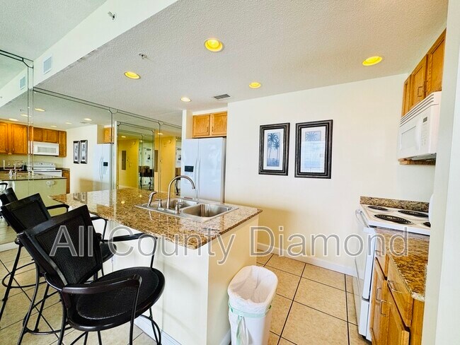 Foto del edificio - 12011 Front Beach Rd