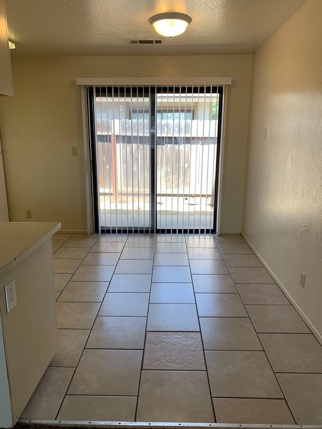 Building Photo - Corner unit available in Armona!