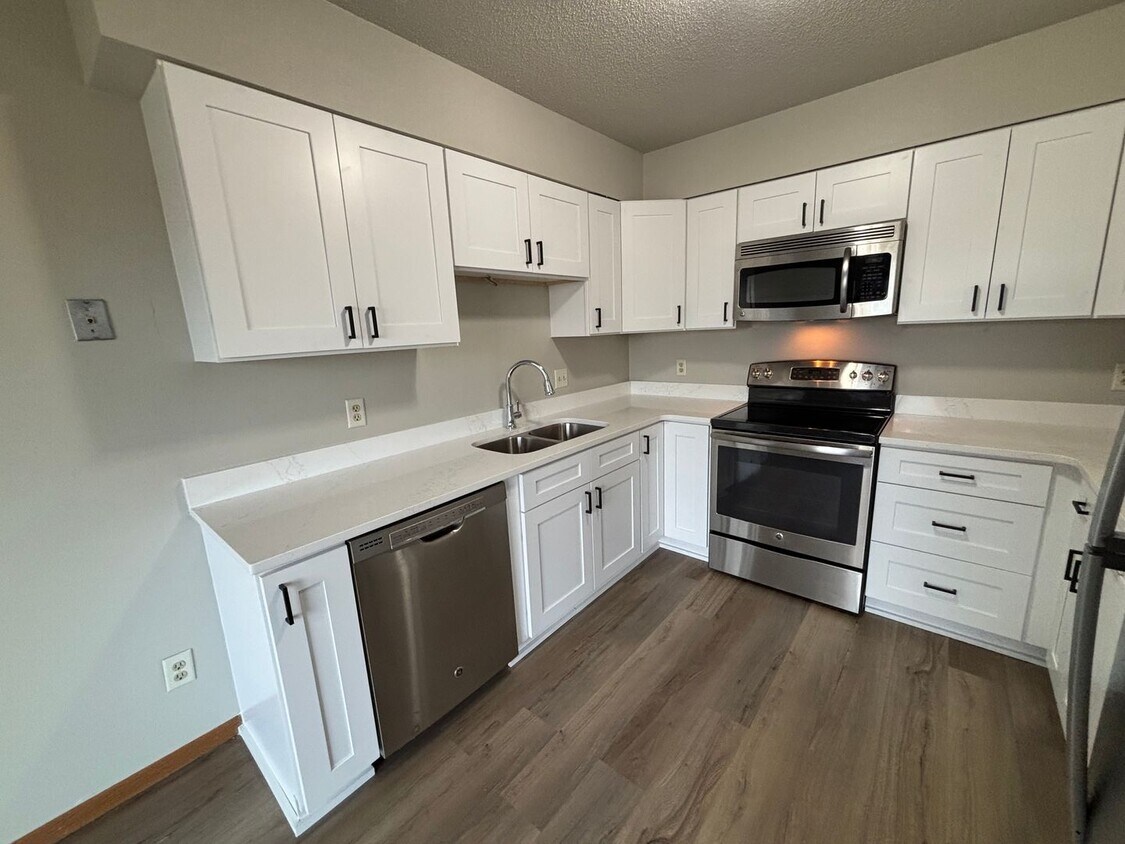 Primary Photo - Quiet Neighborhood Gem: Updated 3BR Townhome with Garage & Yard