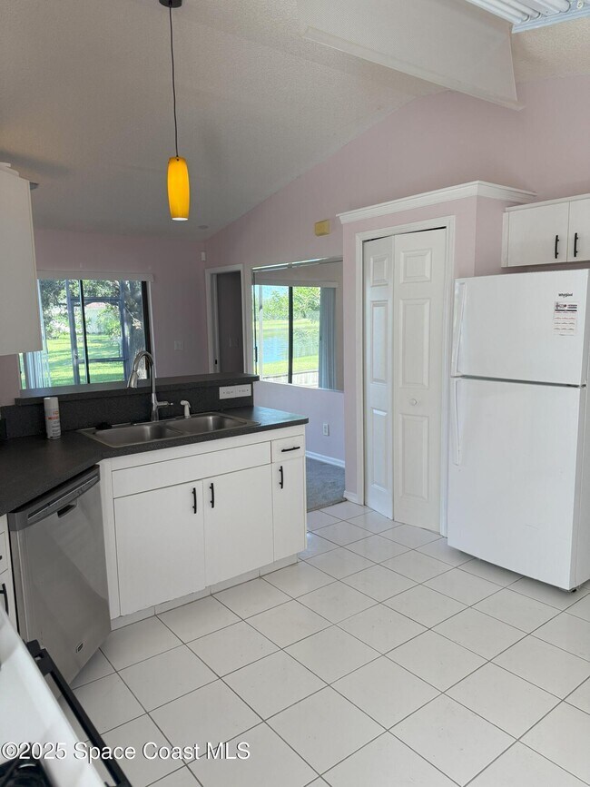 Foto del edificio - 7186 Hammock Lakes Dr