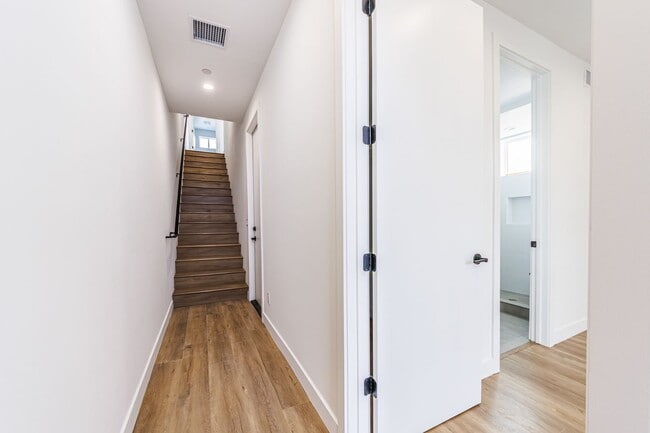 Building Photo - JUST COMPLETED MODERN TOWNHOMES! Never Liv...