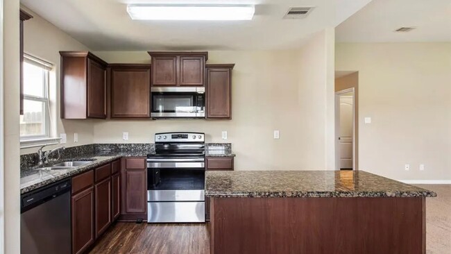 Foto del edificio - 6907 Musclewood Rd