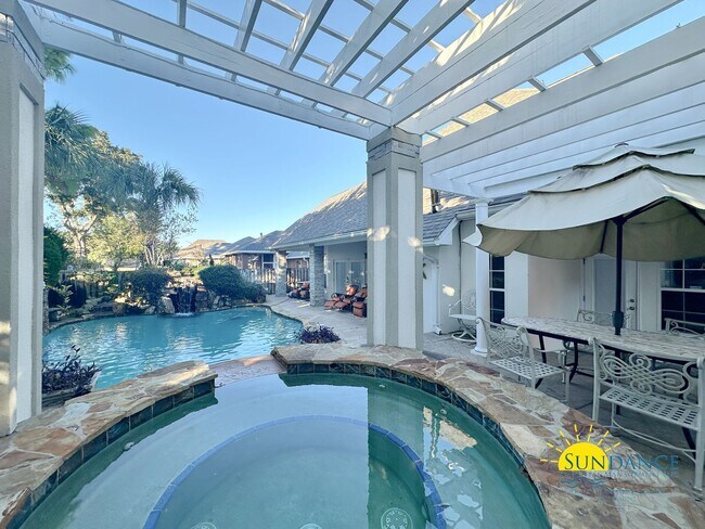 Building Photo - Stunning 4 Bedroom in Gated Community with...