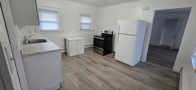 Renovated kitchen 1 - 220 Martin St