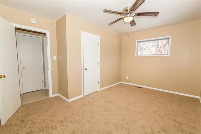 Beautiful bedroom with ceiling fan. - 2950 N Ritter Ave