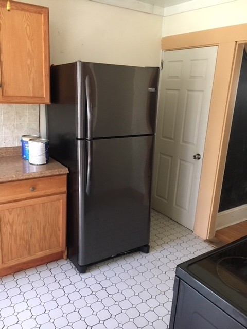 Kitchen with new refrigerator - 149 Commercial Ave