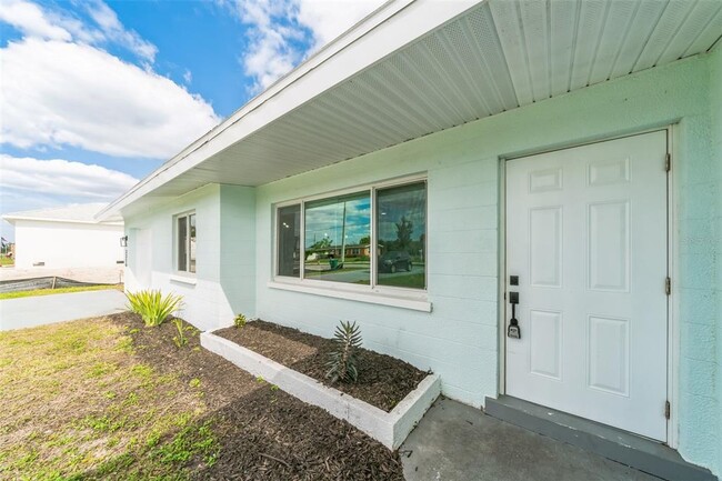 Building Photo - 3316 Port Charlotte Blvd