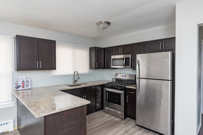 Foto del edificio - 3058 N Kostner Ave