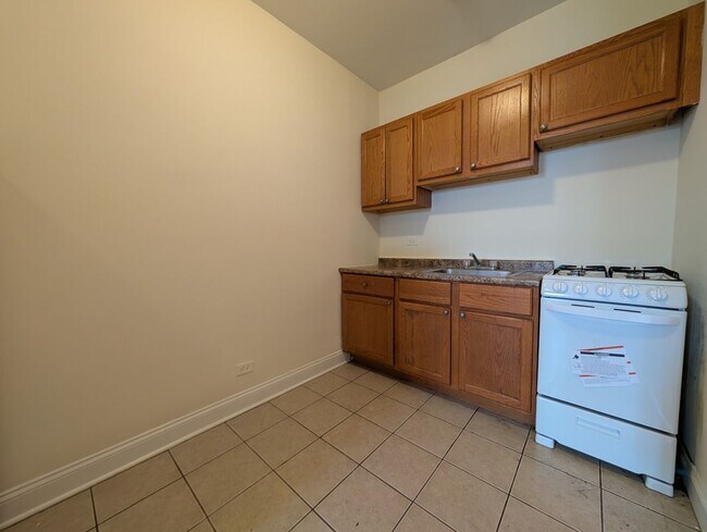 Foto del edificio - 4851 N Damen Ave