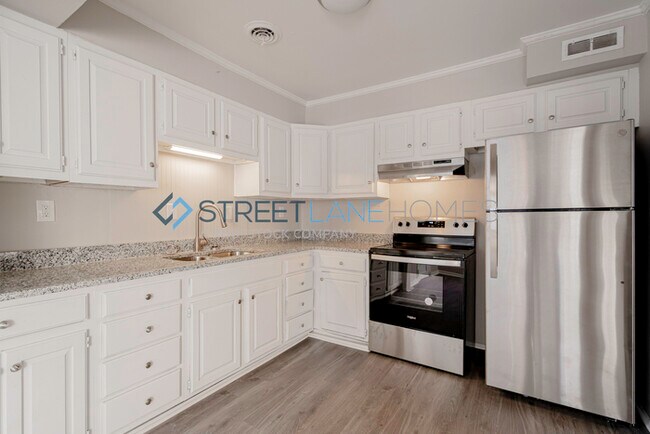 Building Photo - NOW OFFERING HALF OFF THE FIRST FULL MONTH...