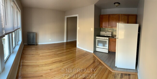 Foto del edificio - 5662 N Ridge Ave