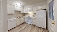 Located at 3636 Spottswood Avenue in Memphis, Tennessee, this single-floor, two-bedroom, one-bathroom unit offers a practical and well-organized layout. Throughout the home, light wood-style luxury vinyl flooring provides a clean, cohesive look, complemented by neutral-toned walls and textured ceilings.

The entry area welcomes residents with multiple windows fitted with blinds, allowing natural light to filter in while maintaining privacy. The kitchen is equipped with ample white cabinetry, a double-basin sink, a white electric range, and a full-size refrigerator, offering efficient storage and functionality for everyday cooking.

A central hallway connects the main living spaces, leading to both bedrooms and the bathroom. The primary bedroom is generously sized and features a sliding-door closet and a window with an outdoor view. The second bedroom also includes a sliding-door closet and is filled with natural light from its own window. Both rooms offer comfortable proportions suitable for various furnishing arrangements.

The bathroom is finished with white square tile surrounding a full bathtub and shower combo, complemented by chrome fixtures for a clean, classic appearance.

Overall, this unit provides a straightforward, functional living environment with consistent finishes and ample natural light throughout.