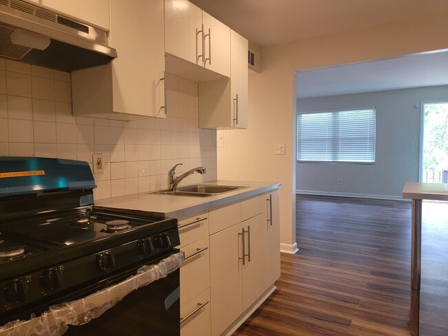 Building Photo - Fully Renovated East Point Gem – Minutes f...